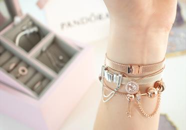 A Pandora charm bracelet.