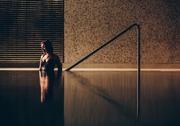 Woman inside the pool at Edwardian Hotel & Spa
