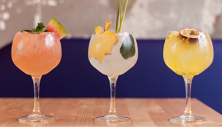 3 colourful fruit cocktail drinkls