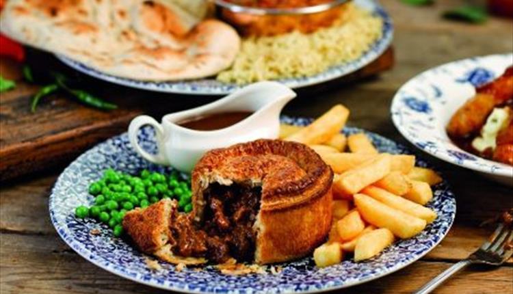 Pie with chips and gravy