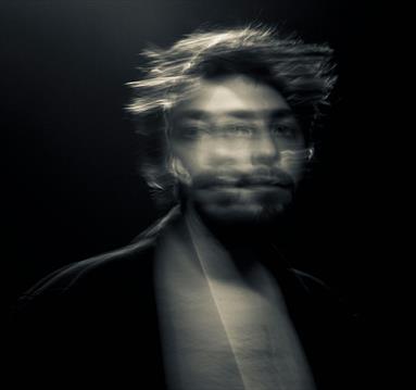 Blurred photo of Salvador Sobral