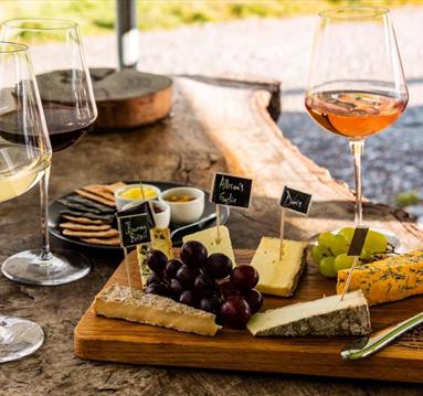 Cheese board with wine and crackers