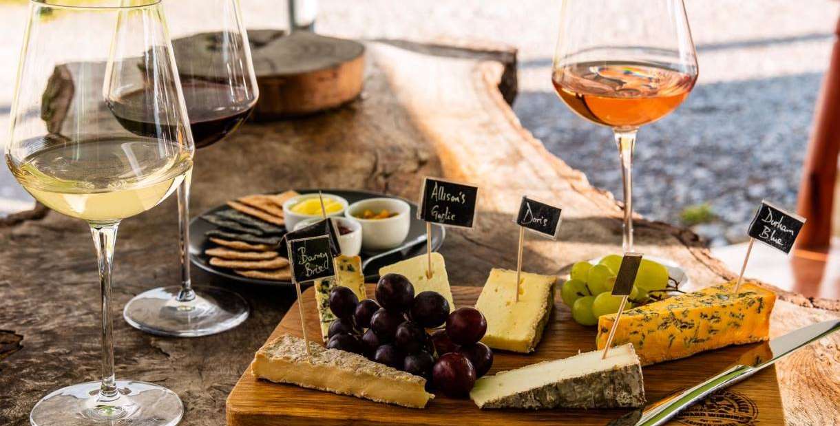 Cheese board with wine and crackers