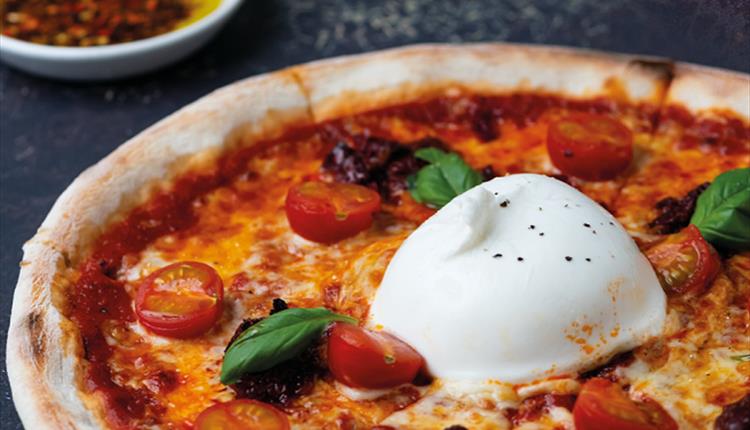 Pizza with burrata at Vapiano Manchester