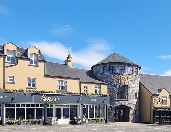 An exterior view of Walsh's Hotel in Maghera charming blend of traditional Irish architecture and modern touches.