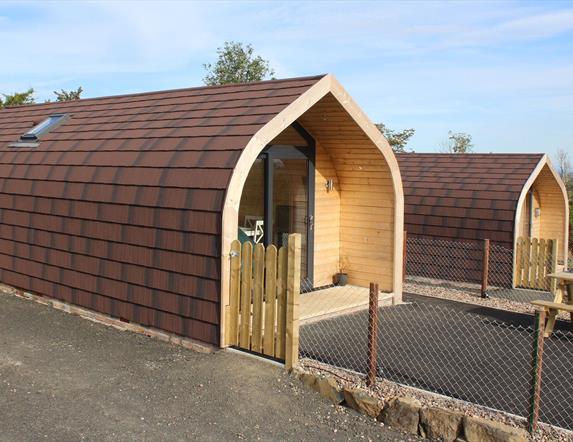 Glamping cabins overlooking scenic mountain view