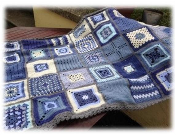 a purple crochet blanket