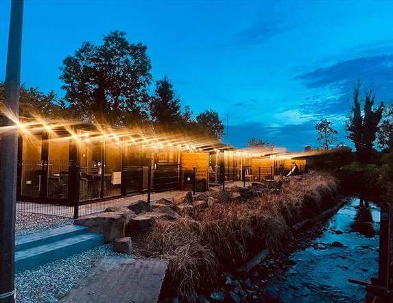 Tables along river walkway