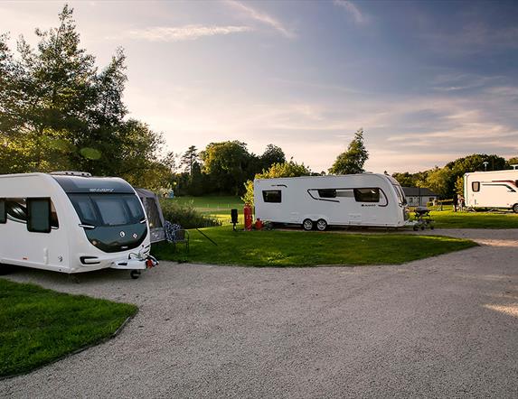 Caravans at Dungannon park in the evening sun.