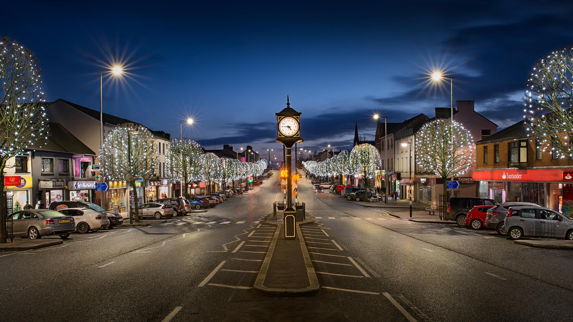 Cookstown street lined with trees with lights