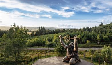 Image of Ceoldan the Giant, with the Sperrin mountains and Davagh Forest in the background. 