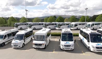 Parking lot full of J&K coaches