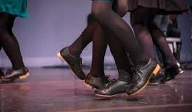 Image of legs and feet performing set dancing