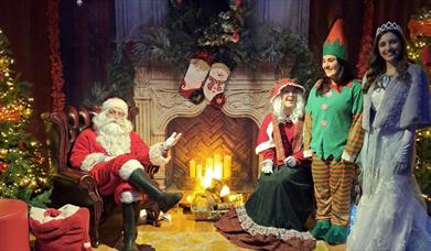 Image showing Santa and his helpers in the Grotto at the Hill of the O'Neill & Ranfurly House