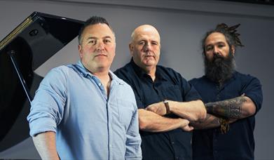 Photo of Irish musicians Ger O'Donnell, Trevor Sexton & Don Stiffe. 