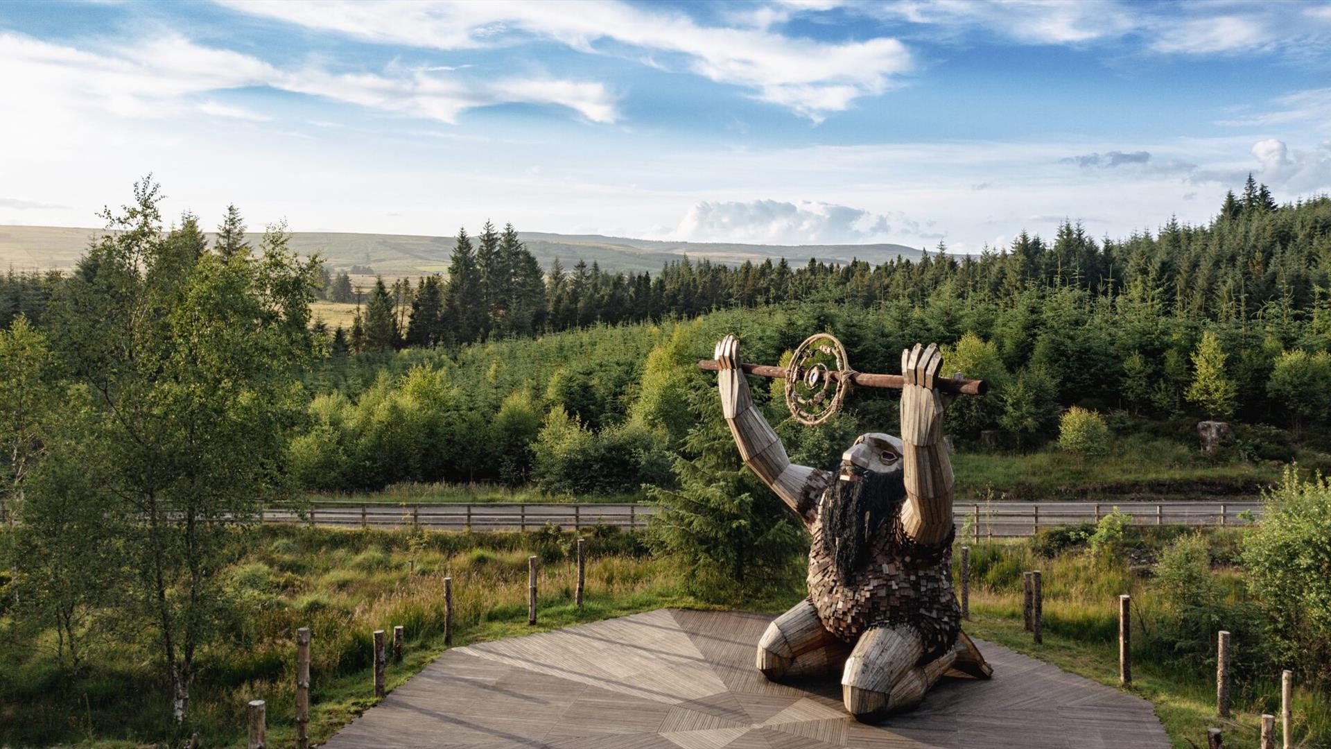 Image of Ceoldan the Giant, with the Sperrin mountains and Davagh Forest in the background.