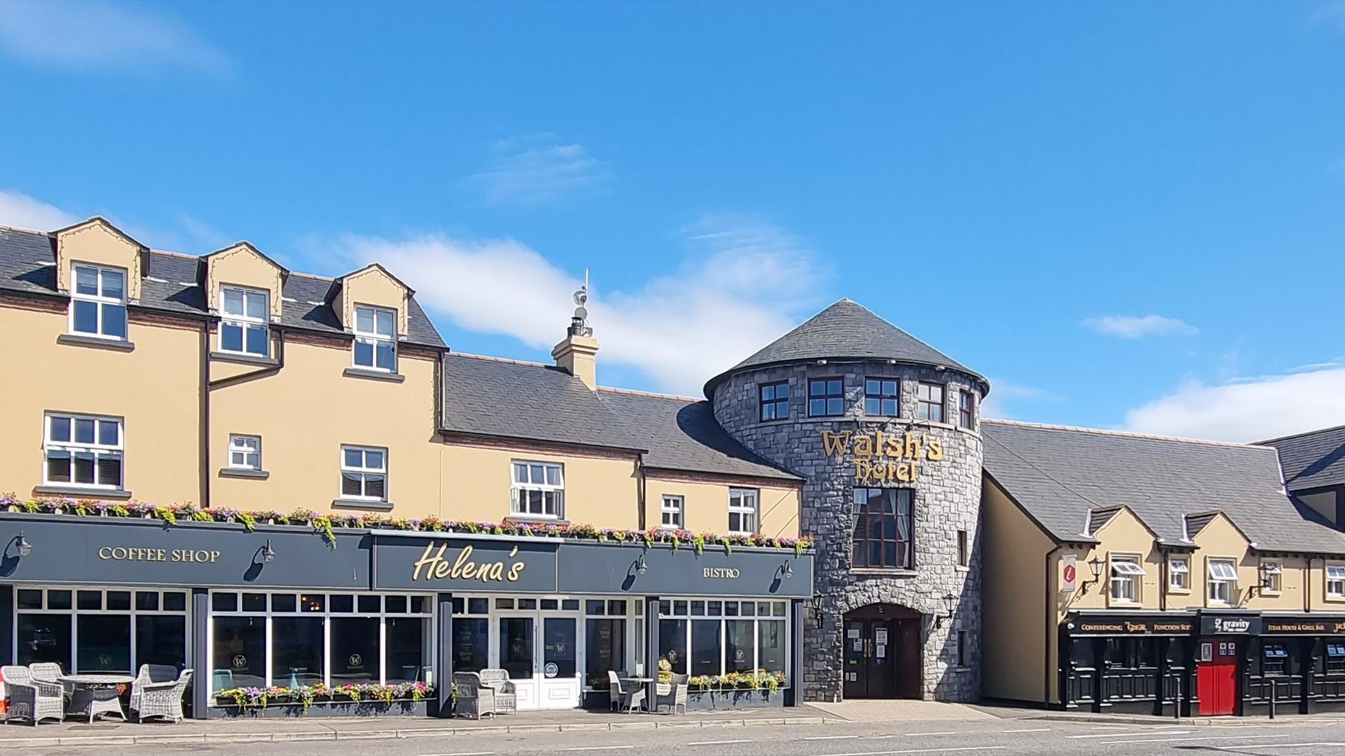 An exterior view of Walsh's Hotel in Maghera charming blend of traditional Irish architecture and modern touches.
