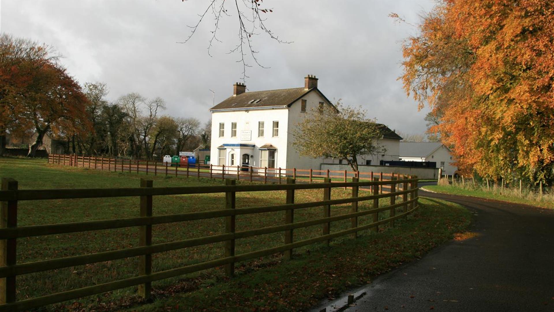 Outside photo of Kilcronaghan Centre with laneway and large grass area