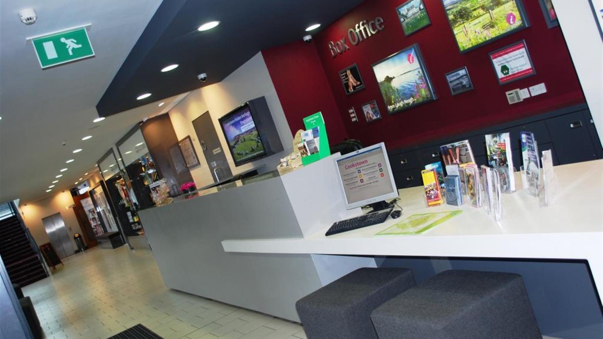 Image of the box office with a desk with various brochures