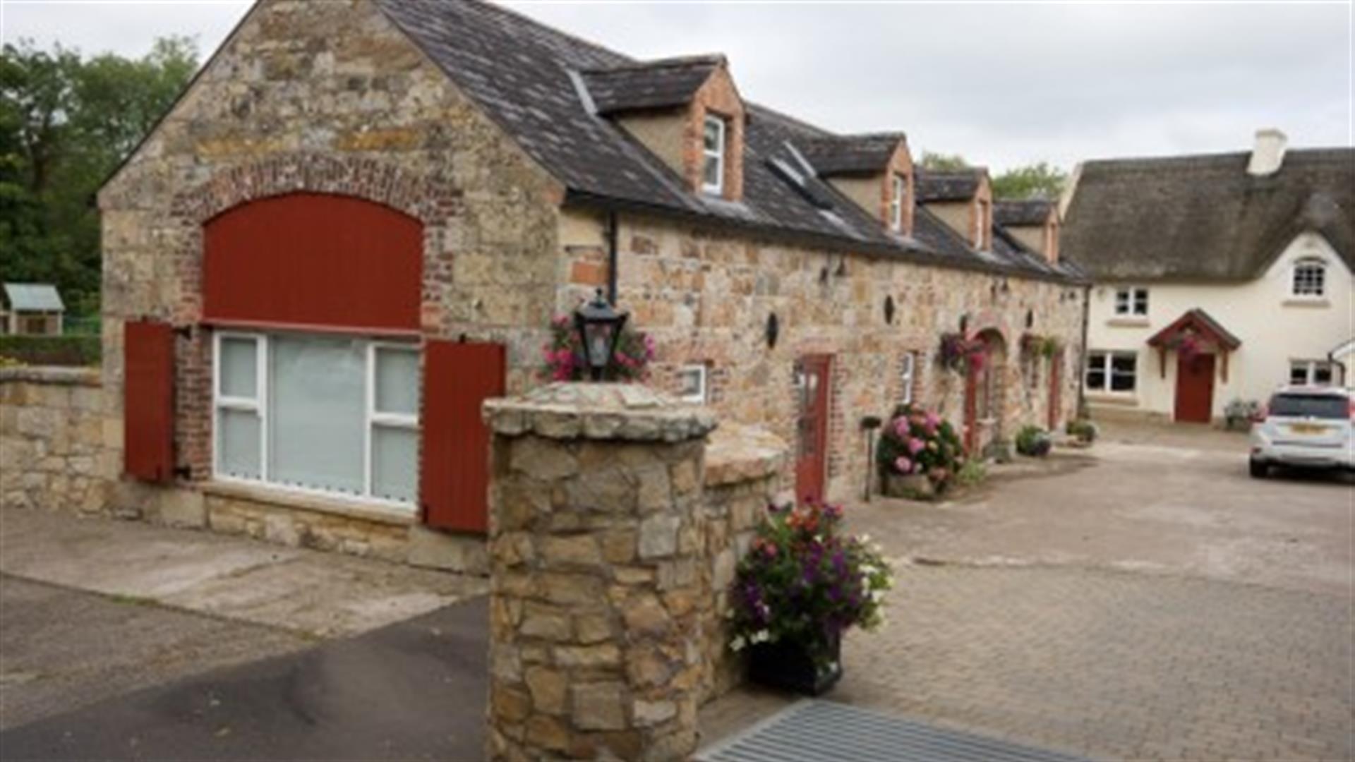 Row of cottages with stone walls