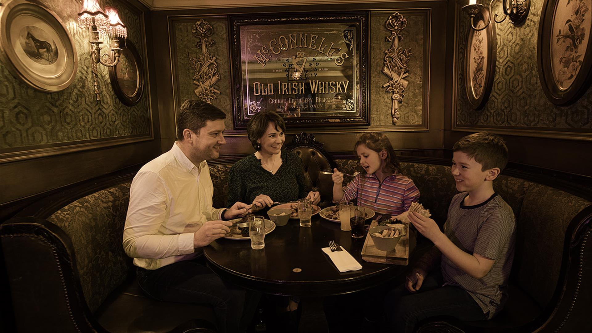 A family having a meal in Dormans restaurant