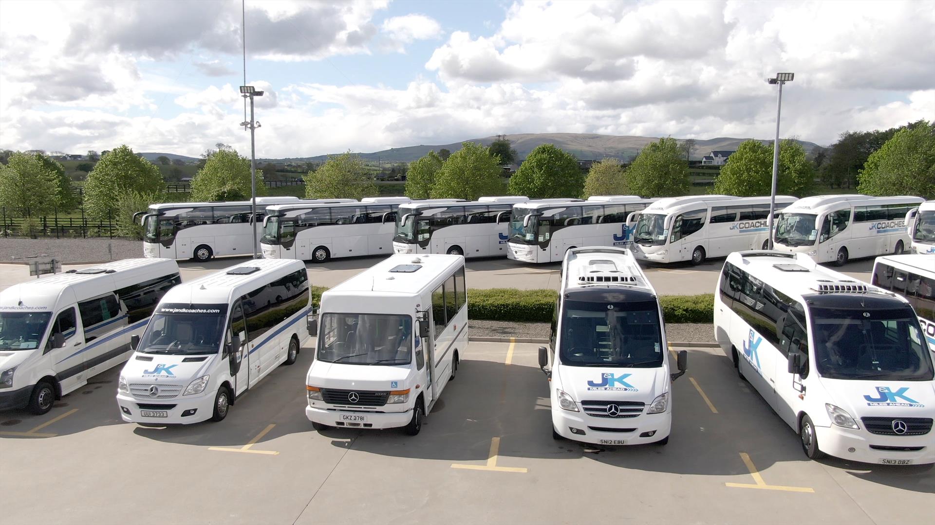 Parking lot full of J&K coaches