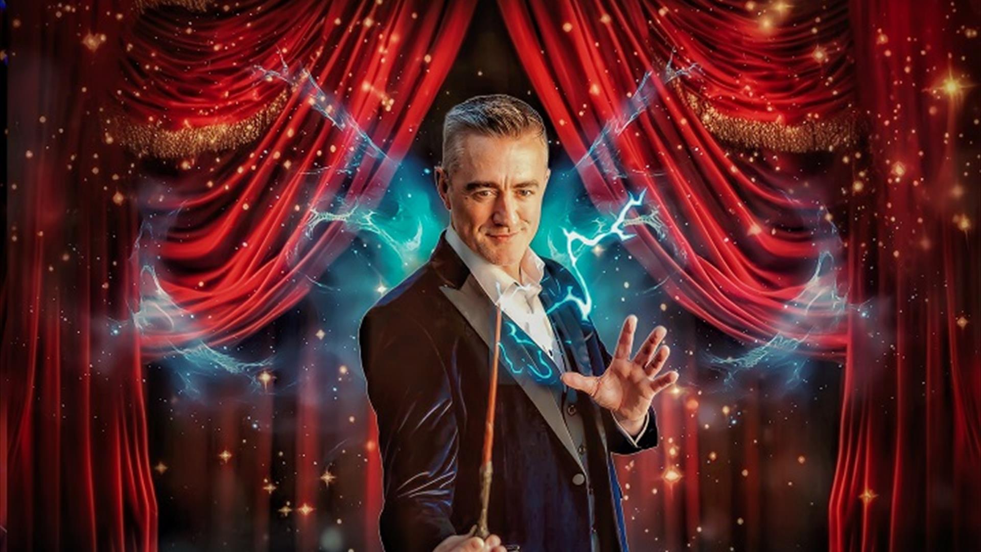 Image of Joe the magician holding a wand