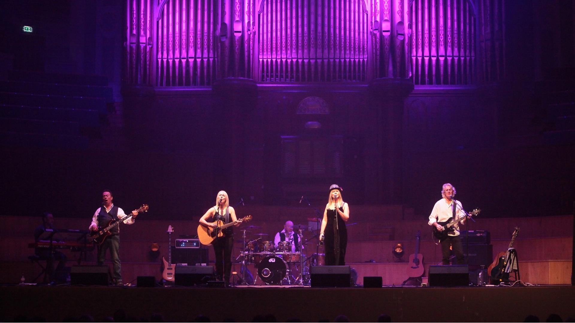 Image of Mack Fleetwood and the band on stage