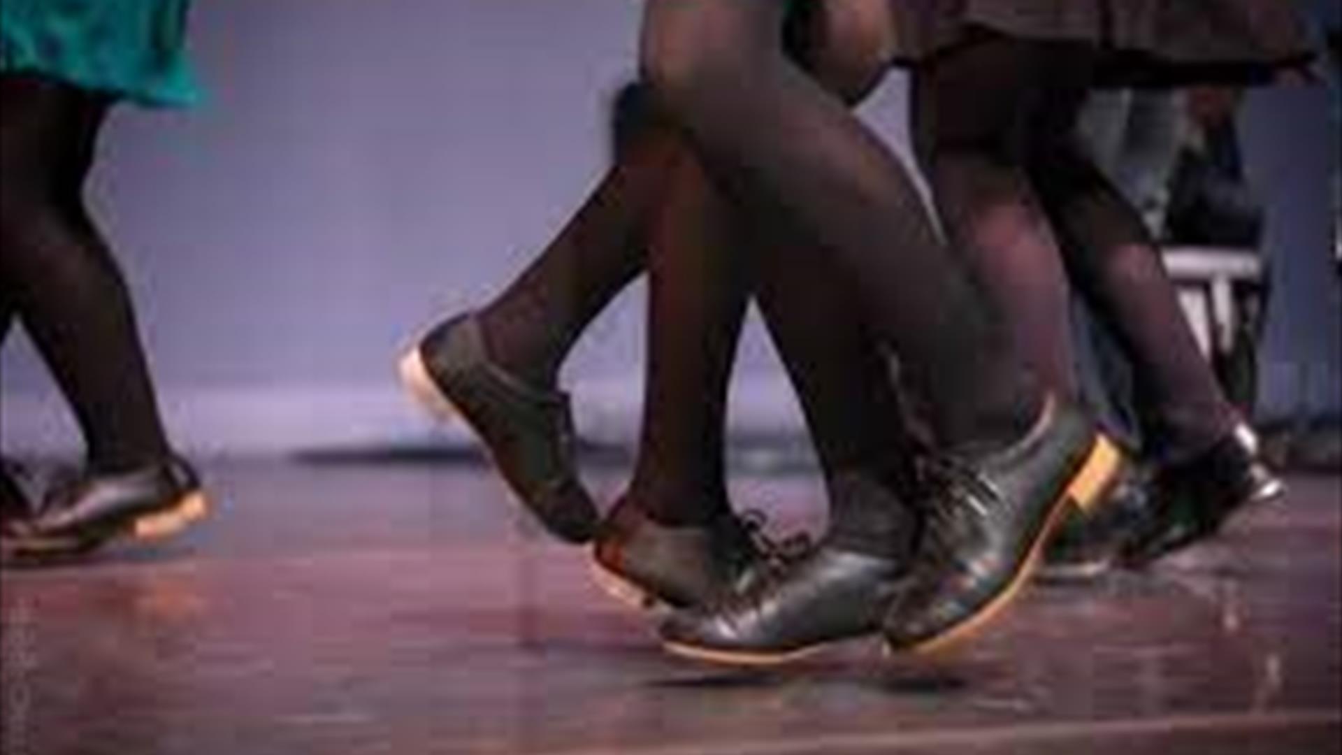 Image of legs and feet performing set dancing