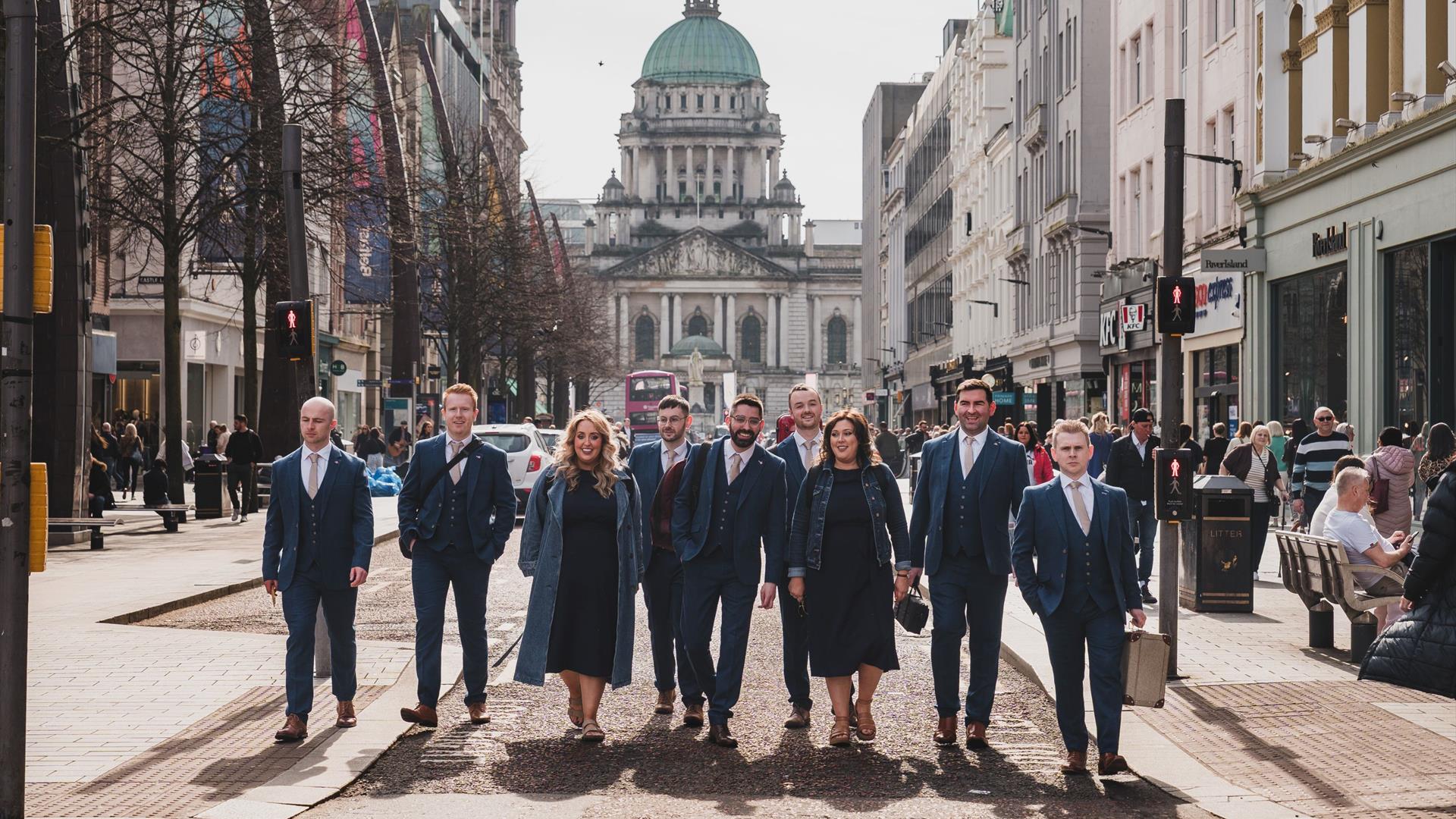 Photo of the band walking through Belfast City Centre