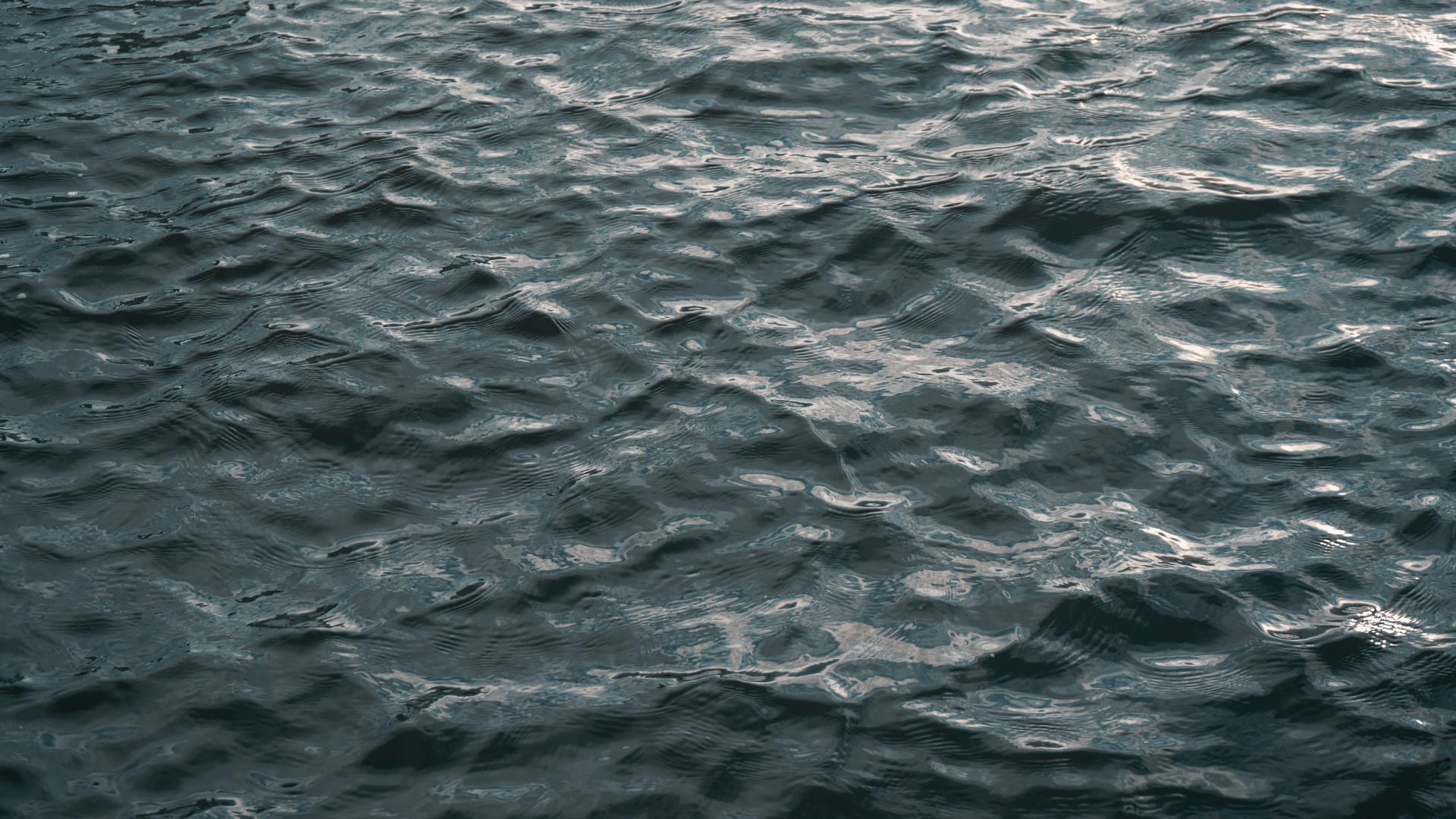 Image showing body of water with dark grey/blue ripples