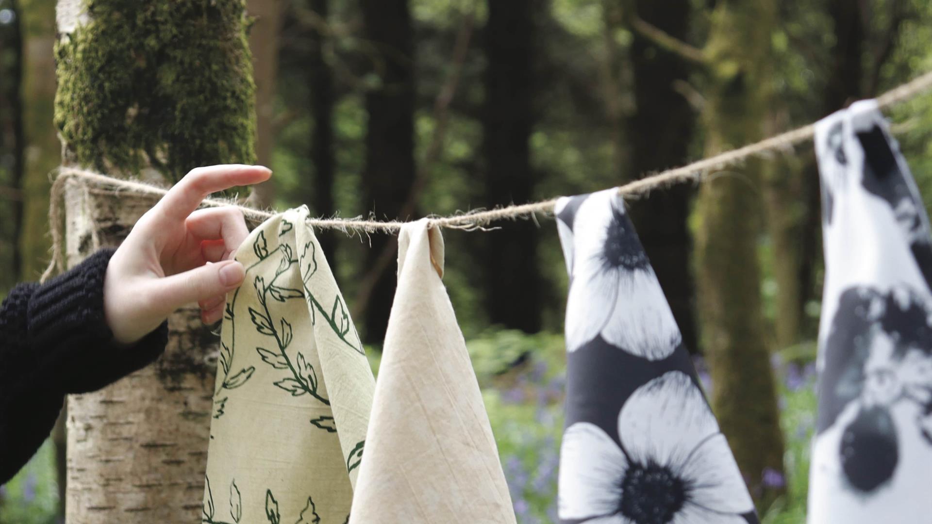 Image of dyed cloth hanging on a line