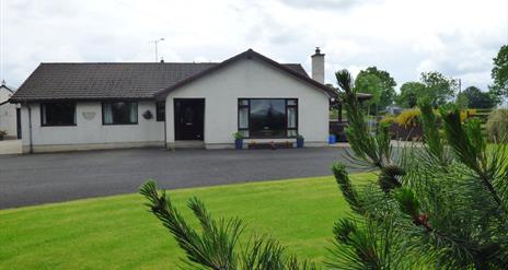 Outside view of house and garden