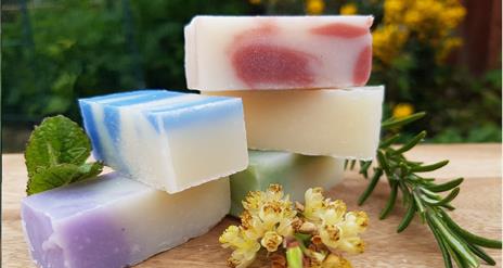 image of three bars of homemade soap stacked on top of each other