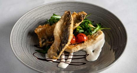 Glenavon Hotel Signature dish of Tempura Pollans, served over Grilled Irish Soda