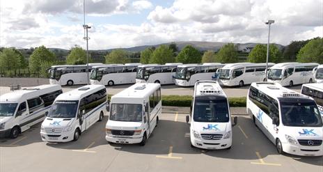 Parking lot full of J&K coaches