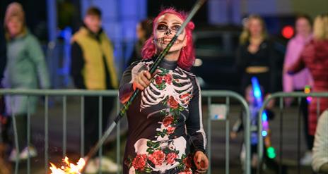 Skeleton fire juggler