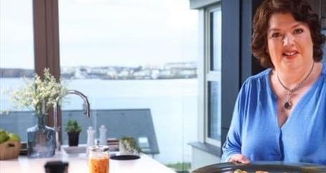 image of Paula McIntyre in her kitchen
