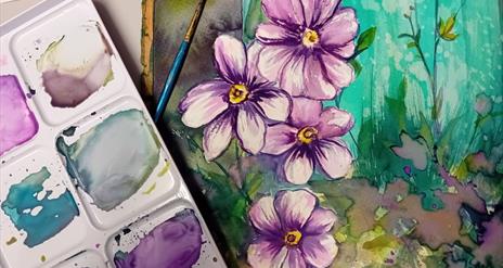 Watercolour painting of purple flowers