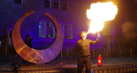 Image of fire juggler