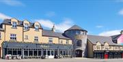 An exterior view of Walsh's Hotel in Maghera charming blend of traditional Irish architecture and modern touches.