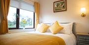 double bed room with bed side tables