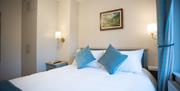 double bed room with bed side tables