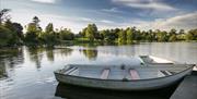 Boats by the jetty on Dungannon Park lake