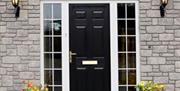 Front door with stone surround