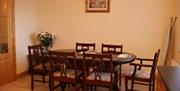 Mahogany dining table and six chairs