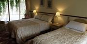 Triple room with 1 double bed and 1 single bed