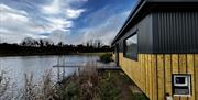 Side image of the Sauna cabin and lake