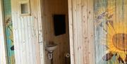Doorways to the bedrooms and the toilet