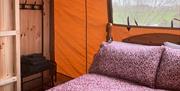 A double bed the floral covers